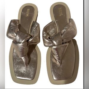 Gold sandals never worn.